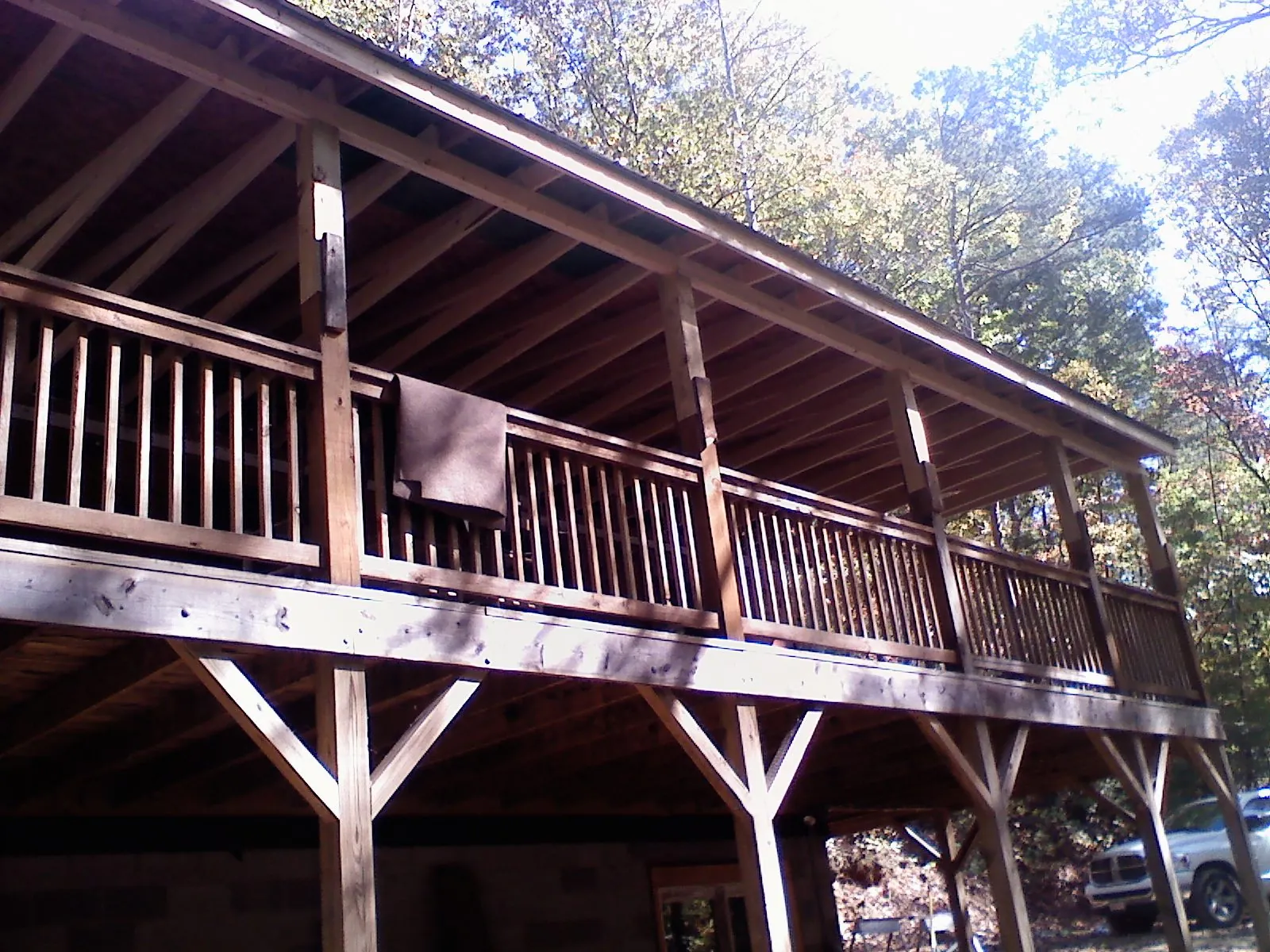 Timber framing under a new elevated porch and deck — Roof Leak Repair in East Hartford by Roofing Brothers